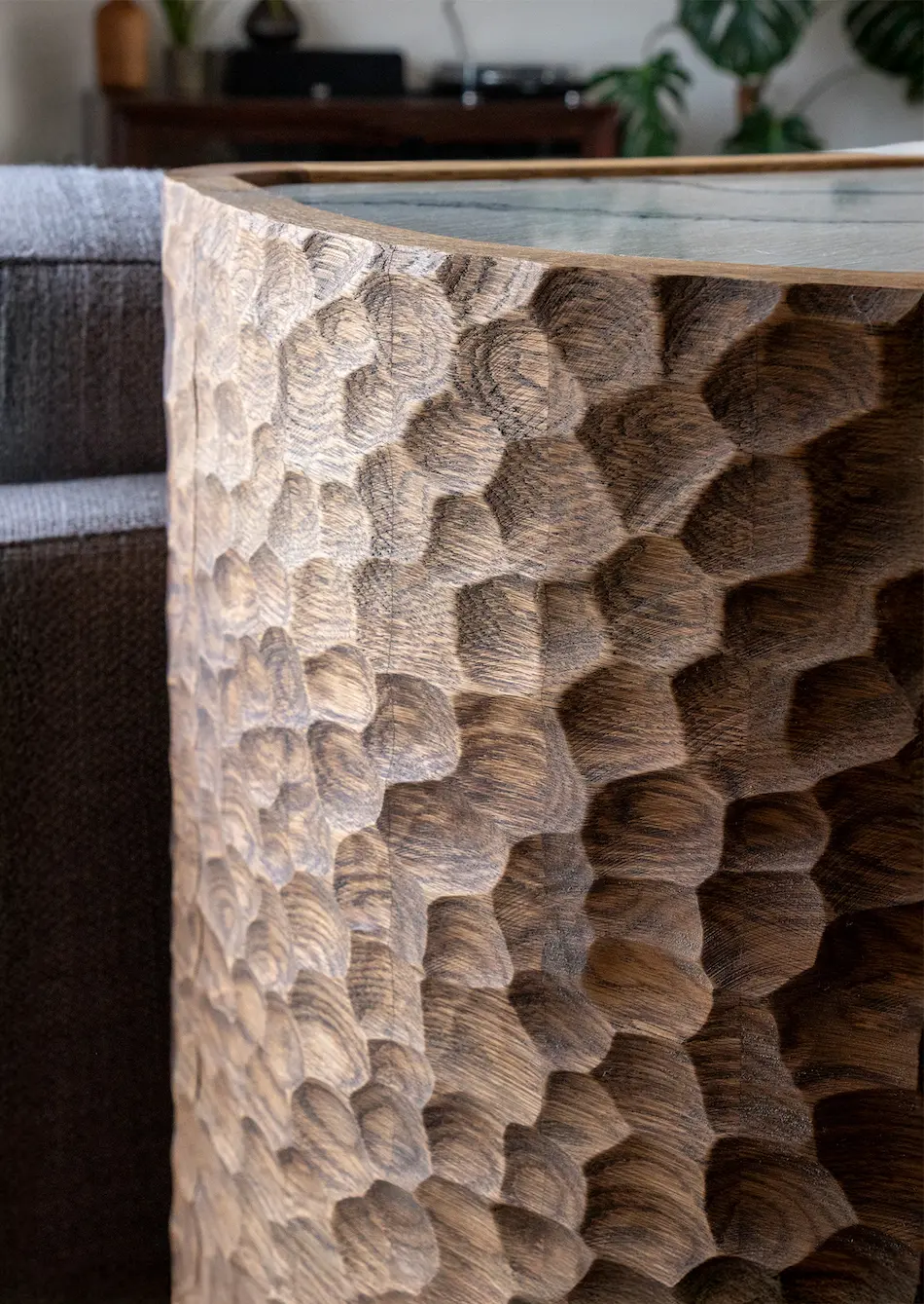 Detail on the handcrafted solid wood doors of the credenza