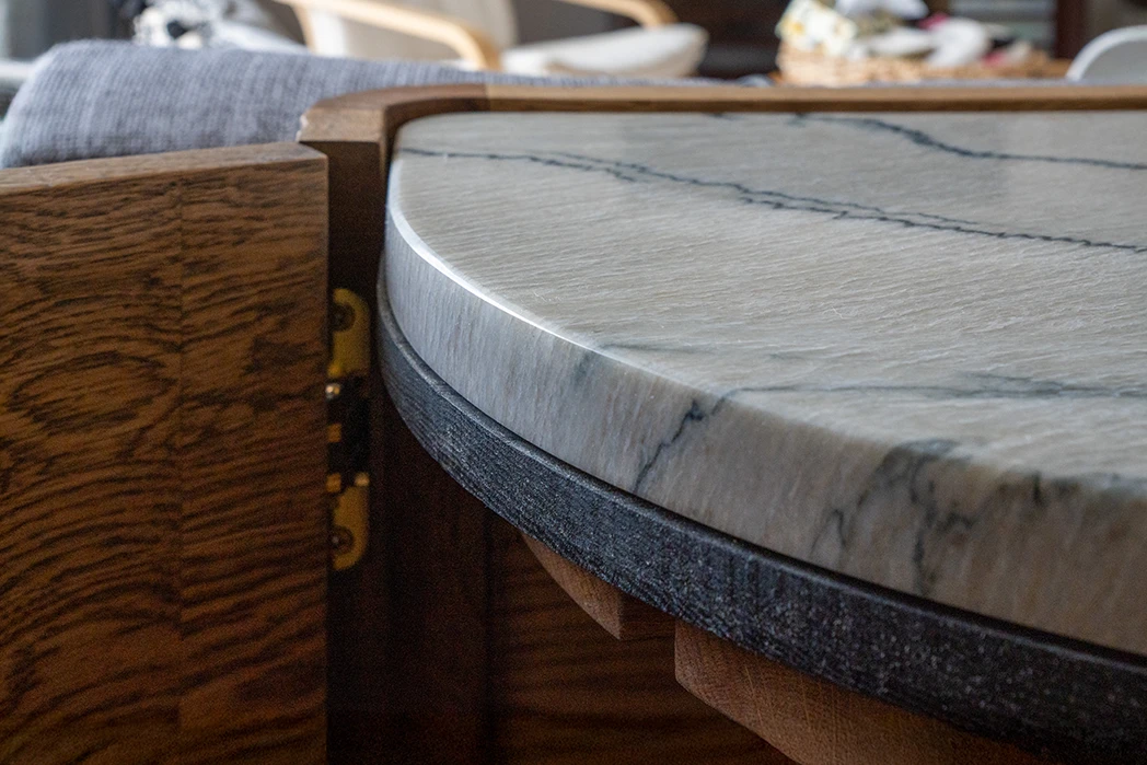 Detail on the solid wood x stone top Whisky Credenza