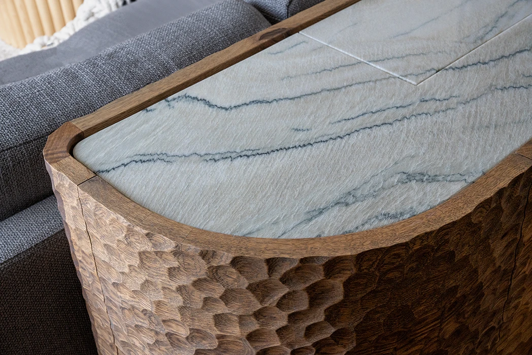 Detail on the solid wood x stone top Whisky Credenza