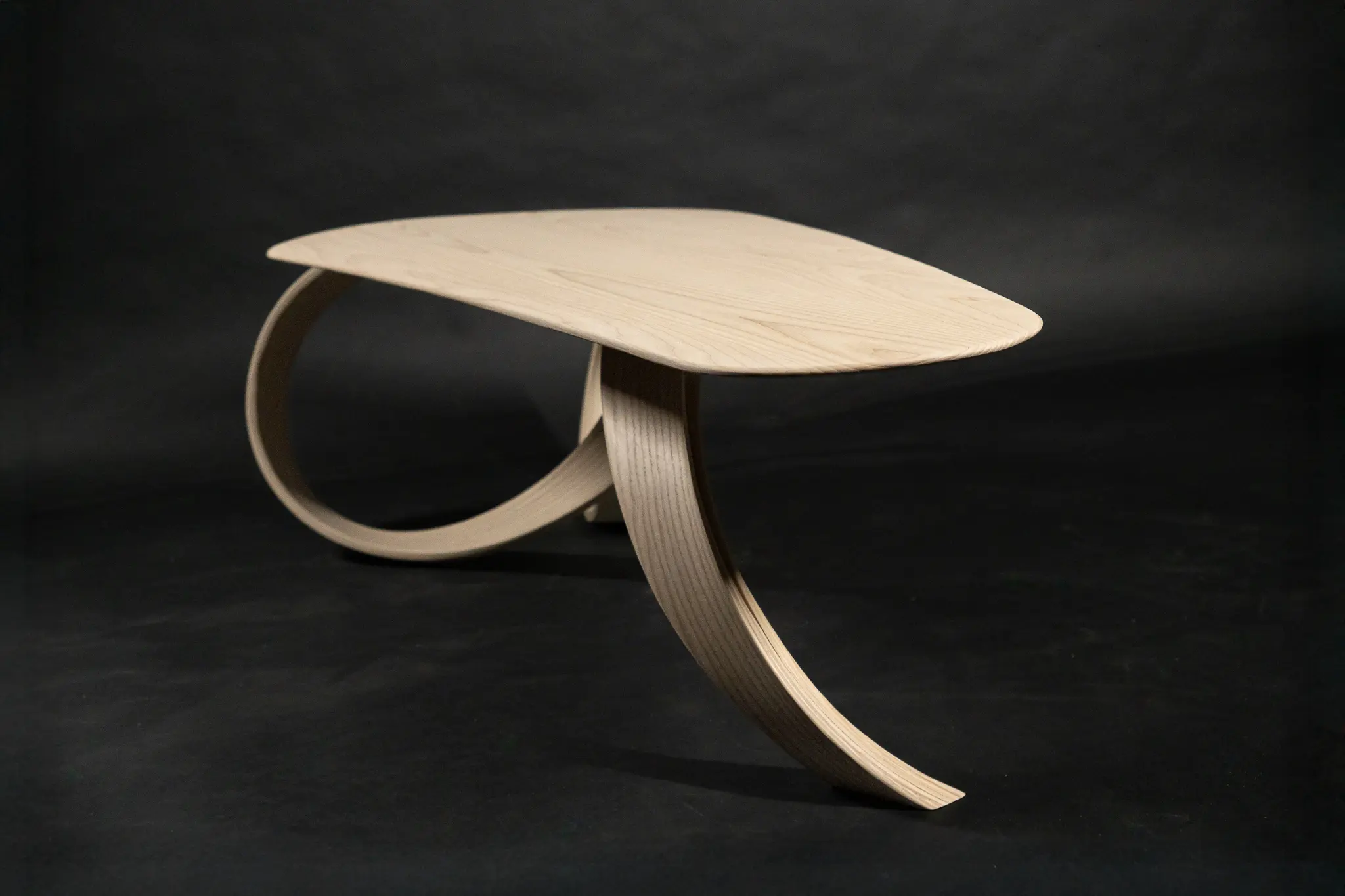Angle view on the bent wood coffee table