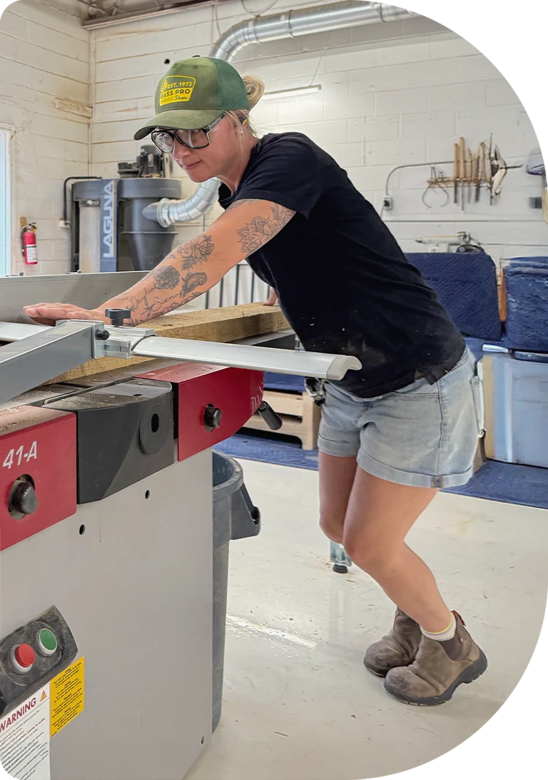 A person working on the table saw